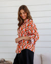 the arely button up collared shirt by label of love is a bright coloured geo print and part of a matching pant shirt set