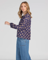 the amore shirt by boom shankar is a button up long sleeve top in a traditional black print pattern made ethically in india