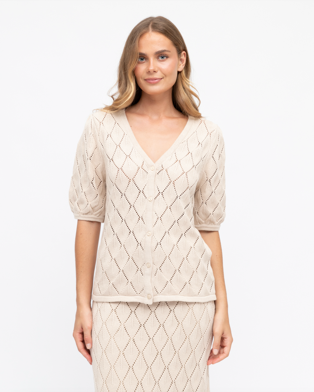 birdie crocheted top by label of love is a beige button up cotton crochet top