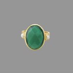 Statement ring featuring green onyx and pearl by Murkani