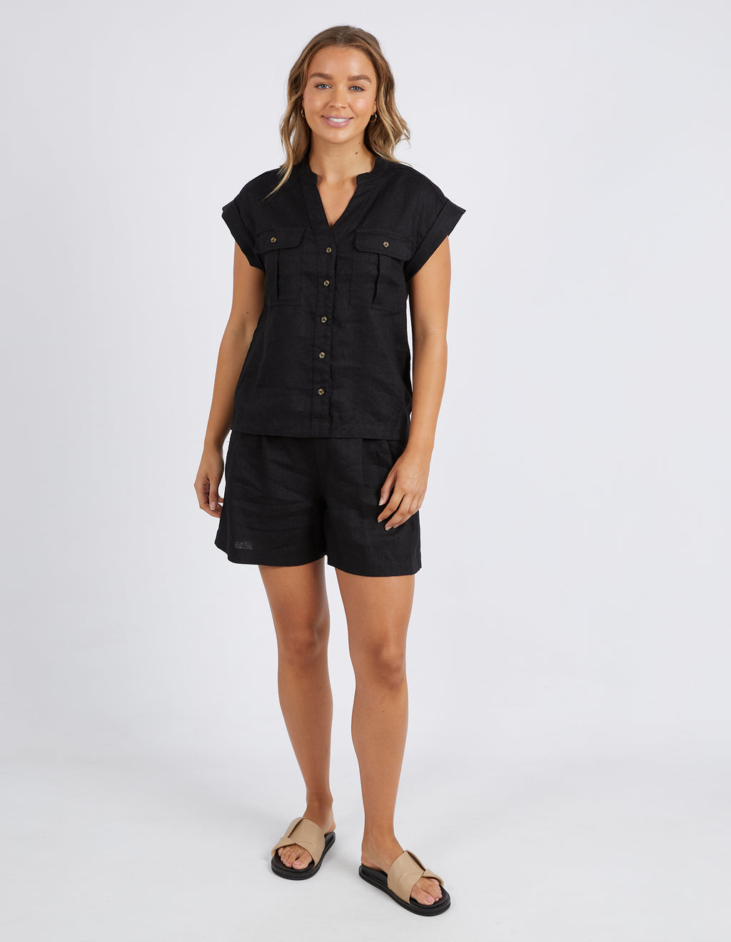 the harlow shirt by foxwood is a black button up the front top in linen with short sleeves