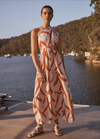 the holiday dress by little lies is a linen blend maxi length dress with a geometric print and off the shoulder