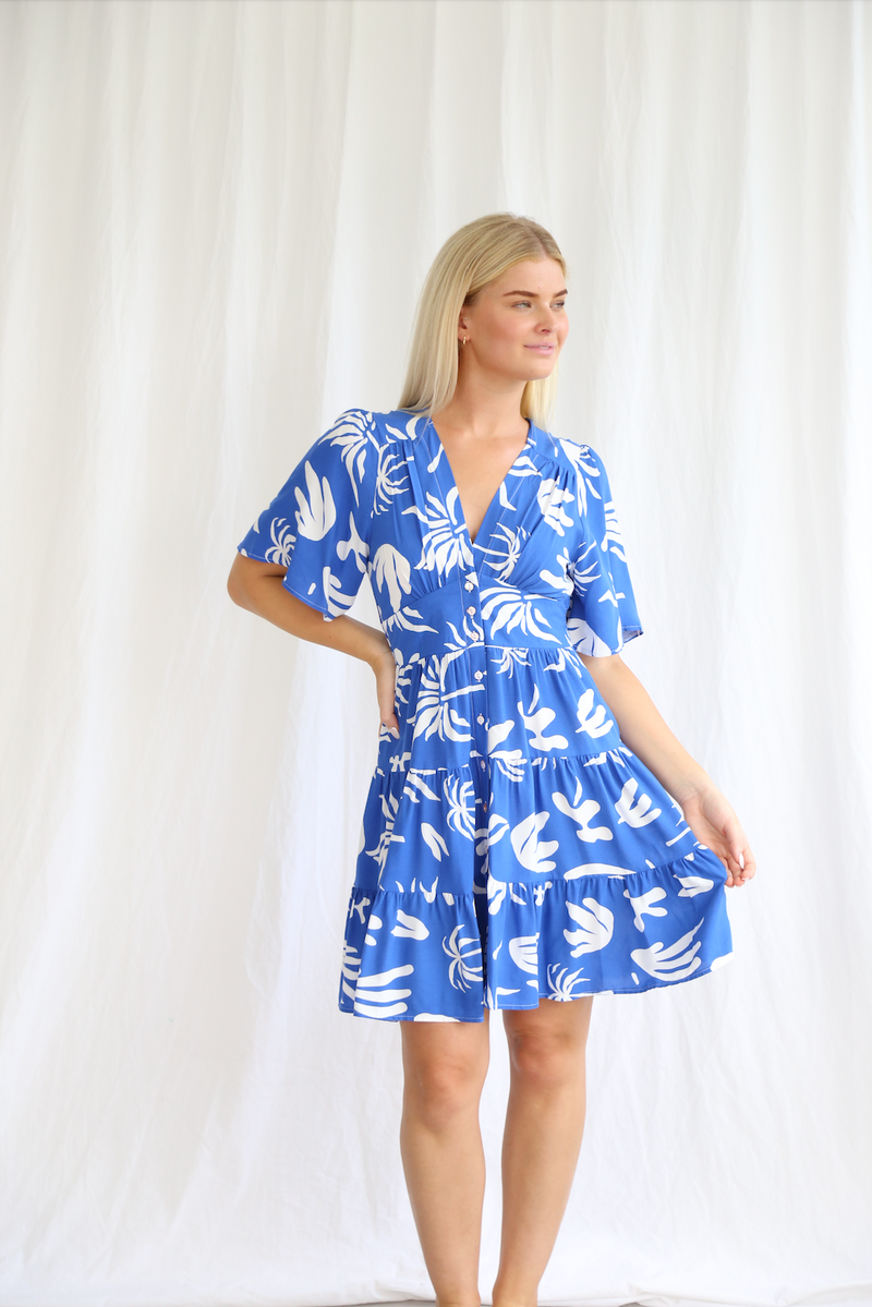 a boho above the knee length dress by salty bright in palm print