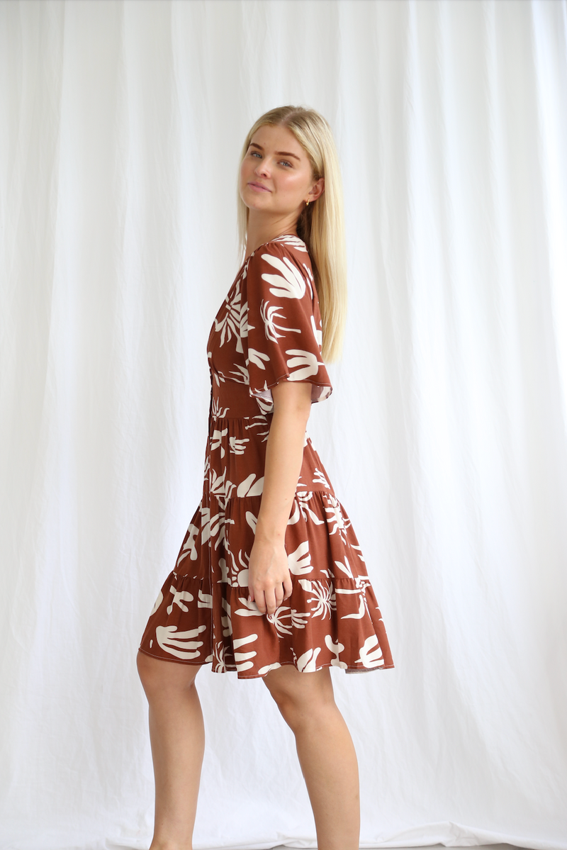 a boho above the knee length dress by salty bright in palm print