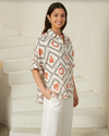 a relaxed fit button up island style boho shirt by iris maxi