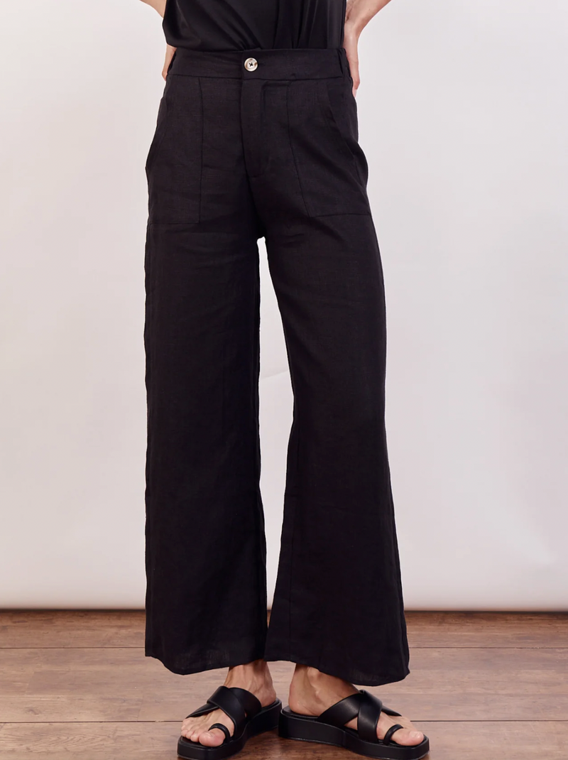 little lies jude linen pants have elastic back and zip and button closure with wide leg and pockets