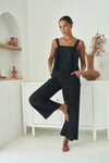 little lies jude linen pants have elastic back and zip and button closure with wide leg and pockets