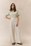 The Jude Linen pants by Little Lies are a wide leg linen pants in natural with zip and button closure and side pockets 