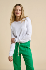 summer tee by little lies is a lightweight linen blend knitted top in green