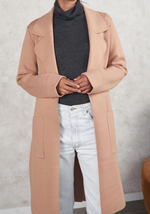The Mimi Coatigan is a thick warm knitted longline cardigan with oversized pockets and lapel collar by little lies