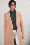 The Mimi Coatigan is a thick warm knitted longline cardigan with oversized pockets and lapel collar by little lies