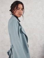 The Mimi Coatigan is a thick warm knitted longline cardigan with oversized pockets and lapel collar by little lies