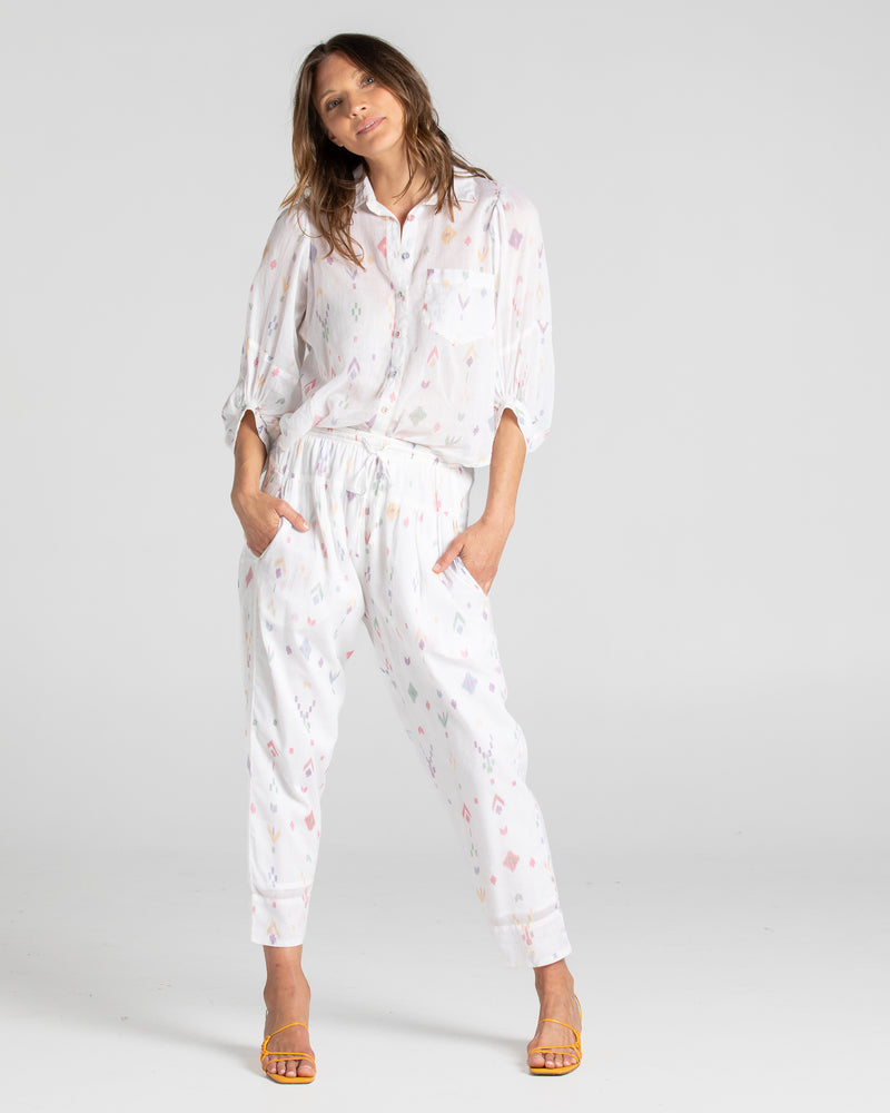 the pari shirt by boom shankar is a super silky soft cotton button up collared blouse with a small aztec print
