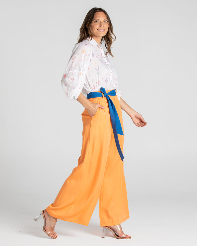 the pari shirt by boom shankar is a super silky soft cotton button up collared blouse with a small aztec print