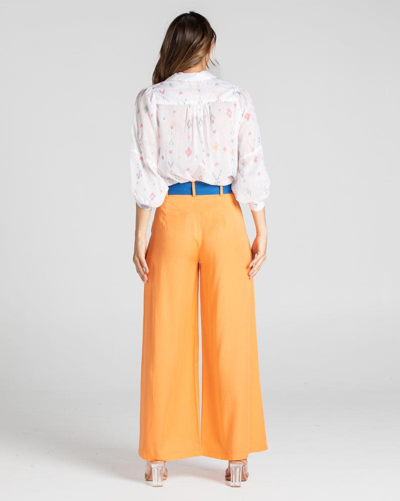 the pari shirt by boom shankar is a super silky soft cotton button up collared blouse with a small aztec print