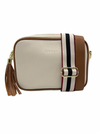 a ecru vegan leather cross body bag by zjoosh with tan contrast piping and straps