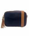a navy blue vegan leather cross body bag by zjoosh with tan contrast piping and straps