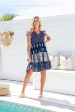 the sophie smoking dress by joop and gypsy is a summer boho navy floral block print knee length dress