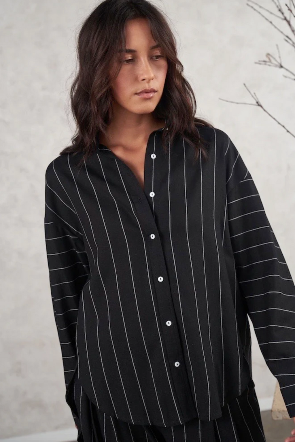 the thea linen shirt by little lies in a black with white pin stripe