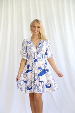 the tuscany dress by salty bright is a summer beach boho blue and white dress