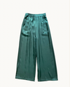 the ella pants by little lies are a silky satin green teal wide leg pant with elastic waist and side pockets