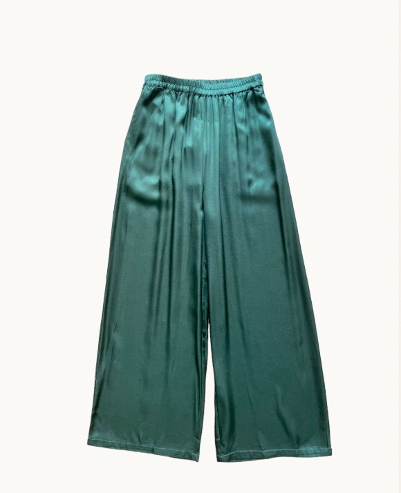 the ella pants by little lies are a silky satin green teal wide leg pant with elastic waist and side pockets