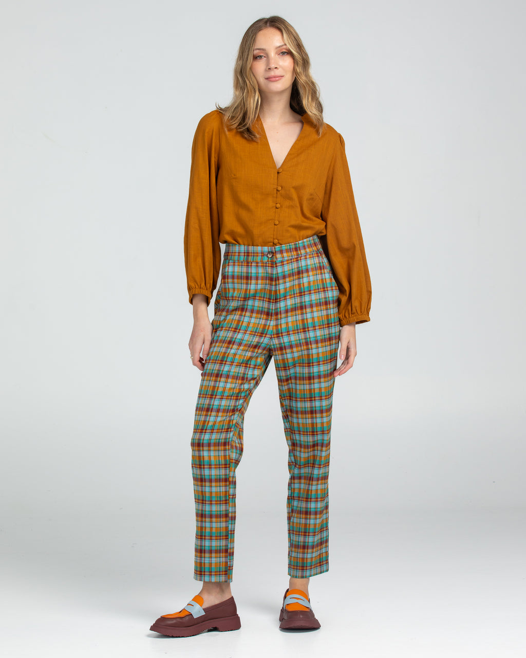 The Kiara pants by boom shankar are ultra modern fitted pant with stretch in a fun check plaid design