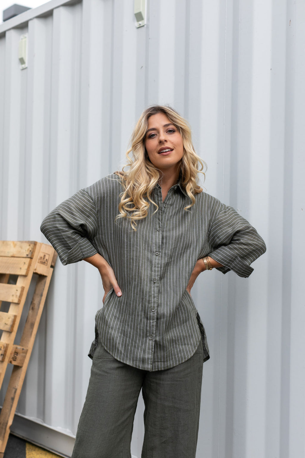the orla stripe shirt from little lies is a khaki and white pin stripe button up collared shirt