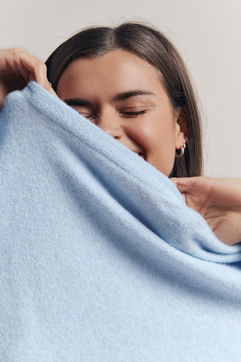 otto knit by little lies is a super soft knitted jumper perfect for layering in Winter in pale blue