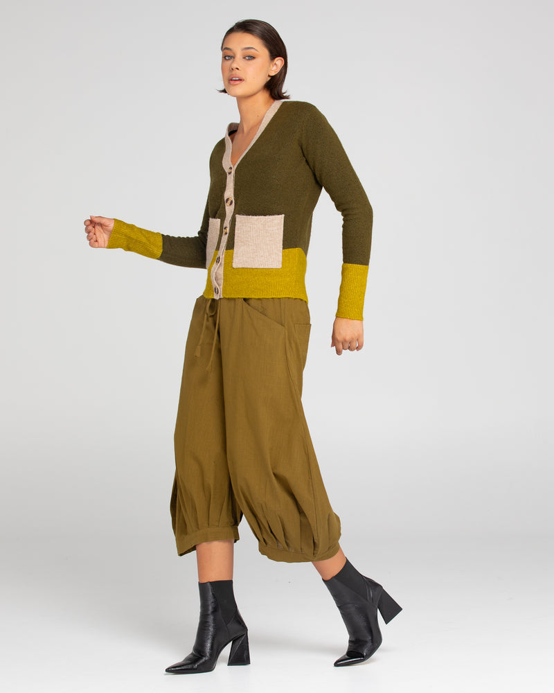 the poet cardigan by boom shankar is a soft and cozy knitted v neck cardigan in olive green with contrast tones for a modern boho vibe