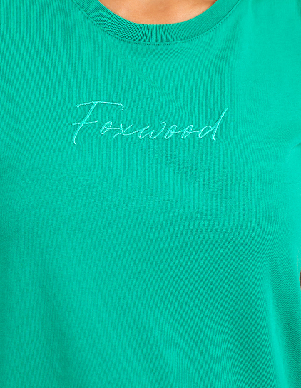 the foxwood signature tee is a soft cotton jersey tshirt with a rolled sleeve in a green color