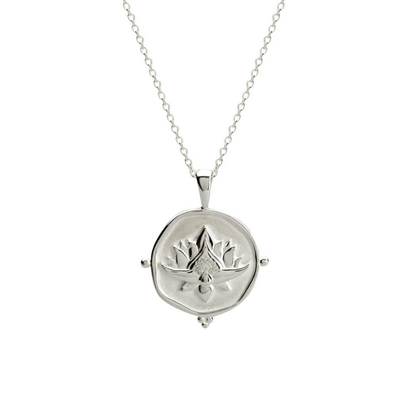 a sterling silver necklace with a blooming lotus design pendant