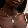 a sterling silver necklace with a rectangle pendant by midsummer star