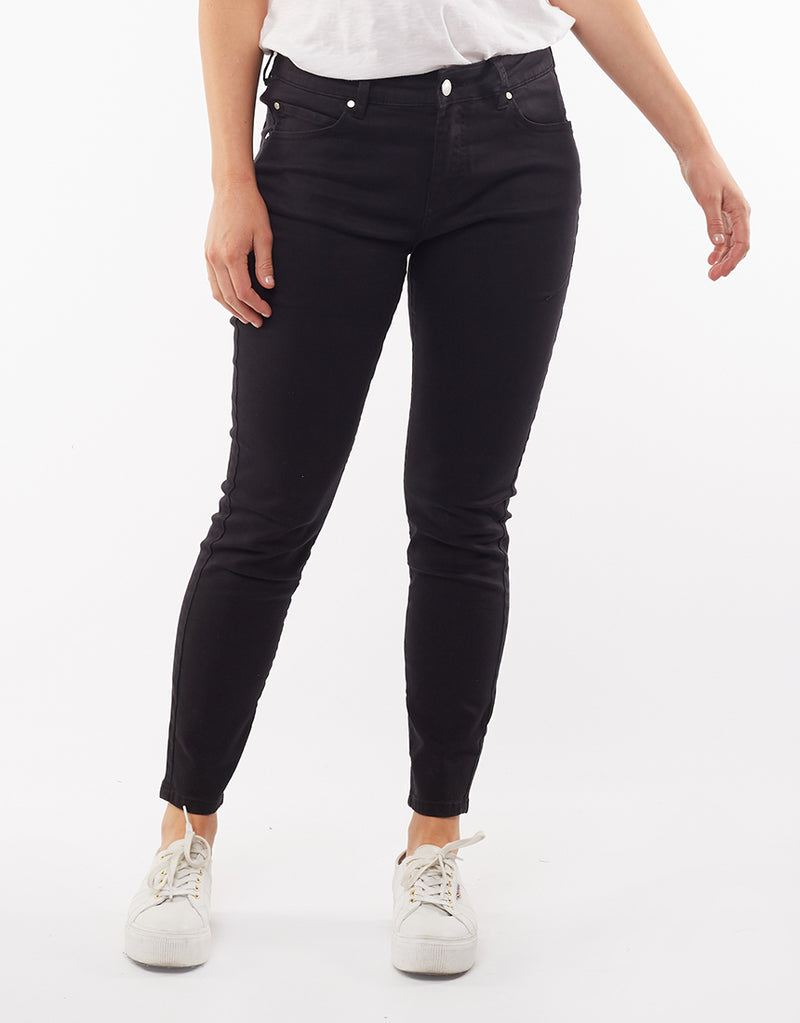 a mid rise skinny leg super soft and stretchy black pair of button up jeans
