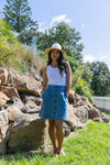 the amanda skirt by foxwood is a denim a-line skirt with feature button up front and flattering mid length with pockets