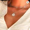 the freedom necklace by murkani is a sterling silver fine chain with a swallow pendant