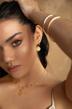 Beautiful 18kt yellow gold plated Into The Light hoop earrings by Murkani. 