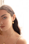 Beautiful 18kt yellow gold plated Into The Light hoop earrings by Murkani. 