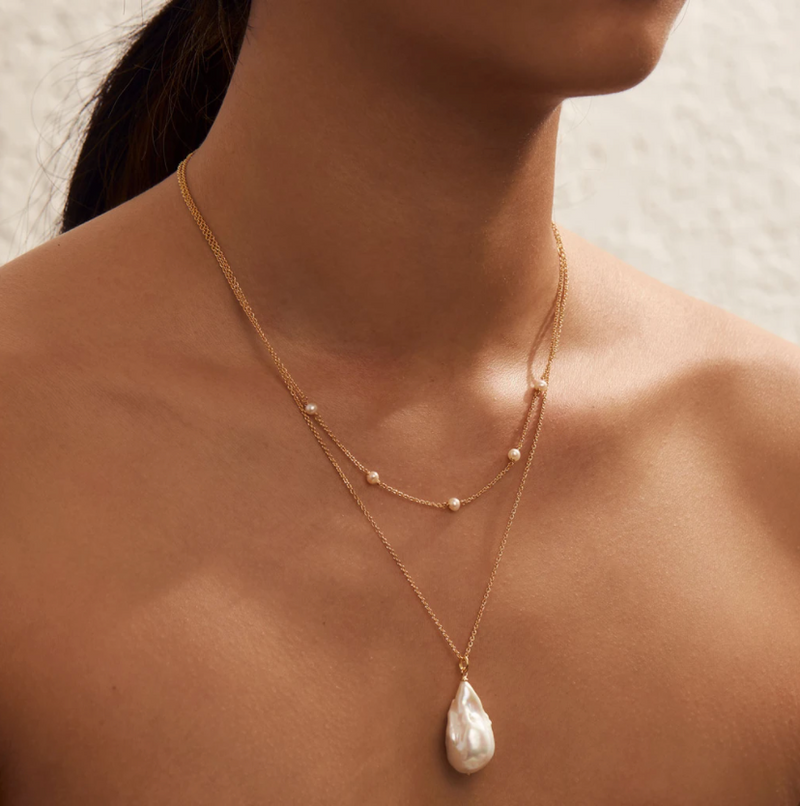 a fine gold pearl necklace by midsummer star jewellery