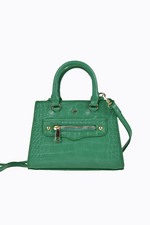 the mini jaden tote bag by peta and jain is a green vegan croc leather bag