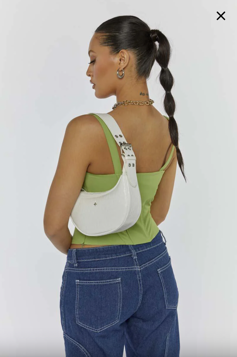 the lolita shoulder bag by peta and jain is. made from recycled vegan leather