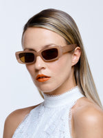 polarised sunglasses with a nude coloured frame