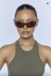 The Tempo Sunglasses by Peta and Jain are classic wrap around on-trend design, with a 90's sporty chic vibe made from recycled polycarbonate