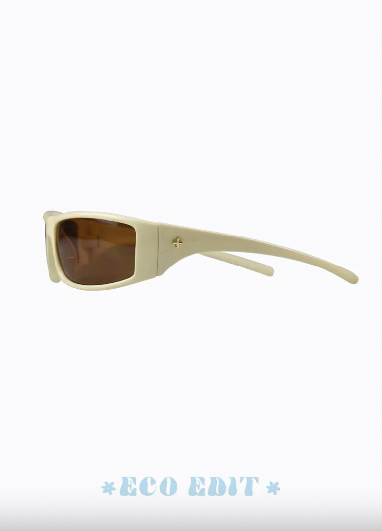 The Tempo Sunglasses by Peta and Jain are classic wrap around on-trend design, with a 90's sporty chic vibe made from recycled polycarbonate